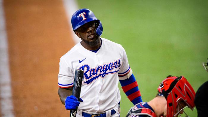 Jun 19, 2021; Arlington, Texas, USA; Texas Rangers center fielder Adolis Garcia (53) reacts to a called strike during the eighth inning against the Minnesota Twins at Globe Life Field.